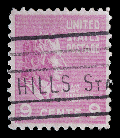 UNITED STATES OF AMERICA - CIRCA 1938: A used postage stamp printed in United States shows a portrait of the President Wiliam Henry Harrison on pink background, circa 1938のeditorial素材