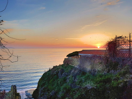 Sunset with villa overlooking the sea.の写真素材