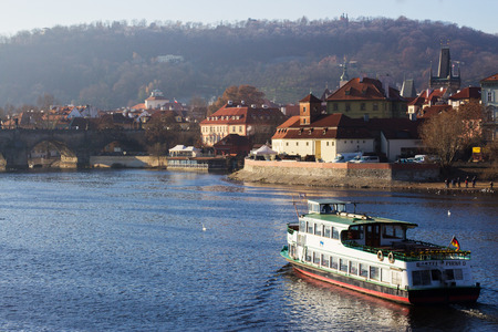 big boat sails on the Prague's riverの写真素材