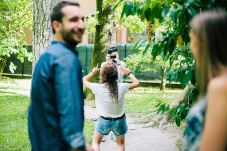 Group of Friends Talking in the Parkの写真素材