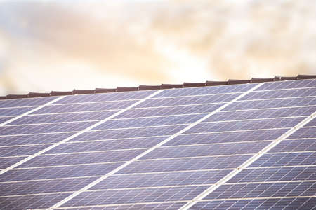 solar panels attached to roof to produce power and energy by sunlight environmental friendly