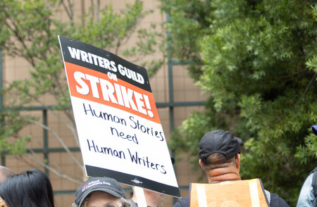Writers Guild of America Strike 2023 in Los Angeles, The unions representing movie and television writers went on strike because of artificial intelligence with sign âHuman stories Need human writersâのeditorial素材