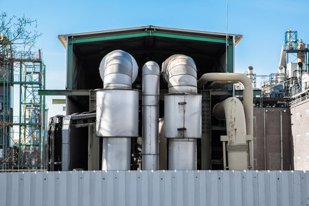 pipes of gas and oil rigged to refinery piping fuel and chemicals to machinery through valves
