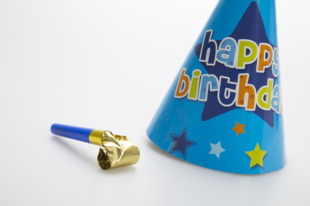 Boys birthday party hat with party blowerの写真素材