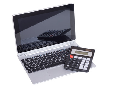 Open laptop computer with calculator isolated on white in a concept of online finances or an e-businessの写真素材