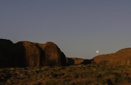 Moonset in Monument Valley Navajo Tribal Park, Arizona.の写真素材