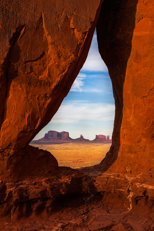 View of Buttes through the Arch Teardrop in Monument Valley Navajo Tribal Park.の写真素材