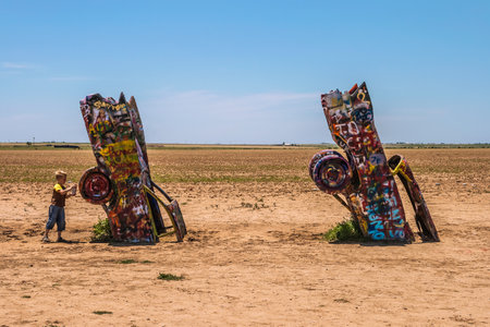 Famous Cadillac Ranch, public art and sculpture installation created by Lord Chip, Hudson Marquez and Doug Michels near Amarillo, Texas.のeditorial素材