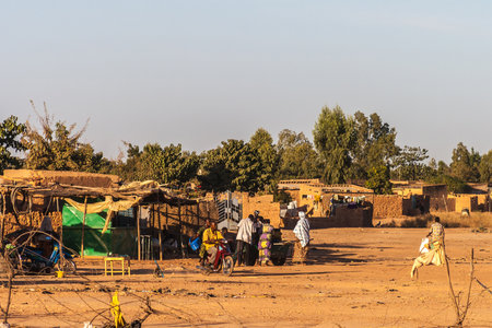 Street scene on the eastern township of Ouagadougou on late afternoon, Burkina Faso.のeditorial素材