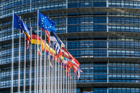 Flags of european countries waving in the courtyard of the Louise Weiss building, seat of the European Parliament located in Strasboug, Franceのeditorial素材
