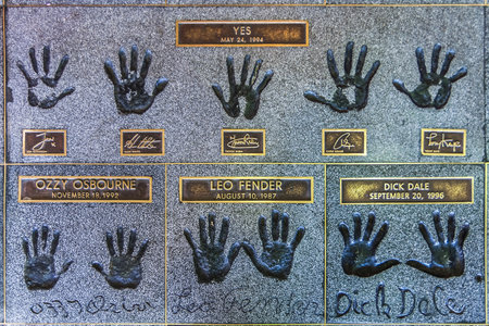 Detail of the Hollywood Rockwalk on the Patio of the Guitar Center store on Sunset Boulevard with handprints of rock musicians and guitar greats, Hollywood.のeditorial素材