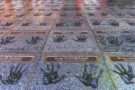 The Hollywood Rockwalk on the Patio of the Guitar Center store on Sunset Boulevard with handprints of numerous rock musicians and guitar greats, Hollywood.のeditorial素材