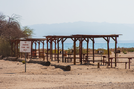 Abandoned park, rest and leisure area, in Salton Sea Beach in summer, California.の写真素材