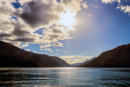 Lake Crescent on a sunny and cloudy day, National Park, Washington State, USA.の写真素材
