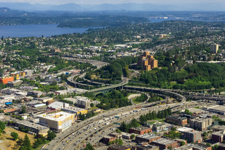 Aerial view of the Interstate 5 expressway in Seattle, the International District, Atlantic, North Beacon Hill, Mt Baker and Lake Washington, USA.の写真素材