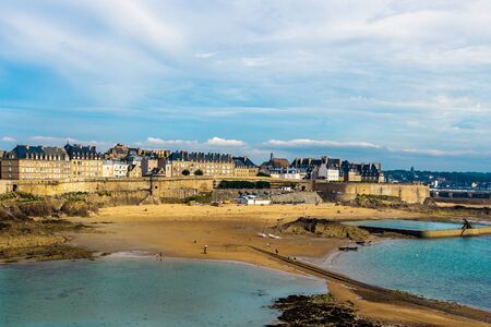 Saint Malo old town ramparts cityscape or skyline and Plage de Bon-Secours on a sunny day, Brittany, France.の写真素材