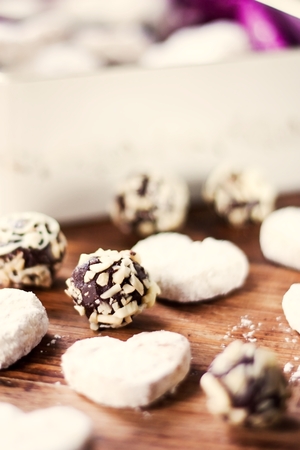 Chocolate almond candies and vanilla cookiesの写真素材