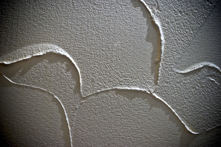 White or beige bright structural plaster background or textureの写真素材
