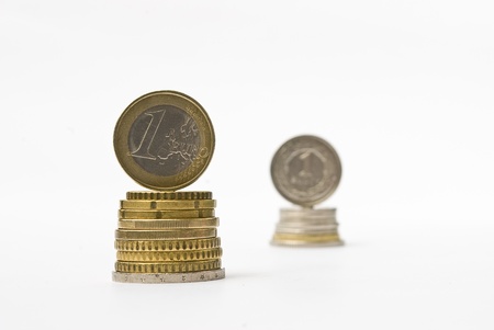 Stack of money euro and zloty coins  Currency rate comparison conceptの写真素材