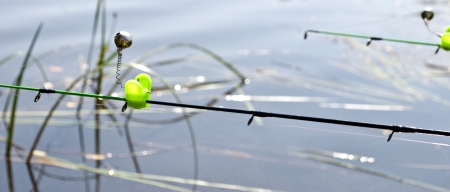Feeder method in fishing and bells on the rods tipsの写真素材