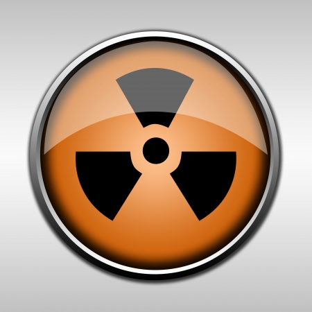 Orange glossy radioactive buttonの写真素材