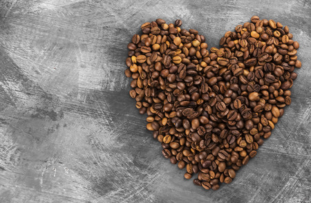 Coffee grains on a dark backgroundの写真素材