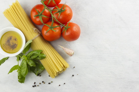 Ingredients for paste: spaghetti, basil, tomatoes, garlic, pepper, olive oilの写真素材