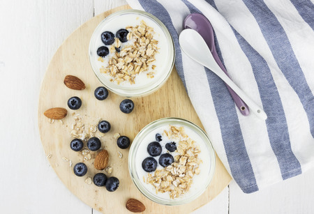 Yogurt with blueberry on a white background.の写真素材