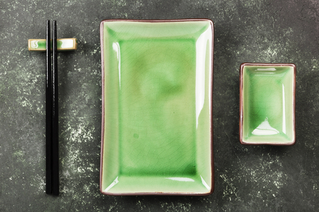 Traditional ware for Asian food on a green background. Top view. Food backgroundの写真素材