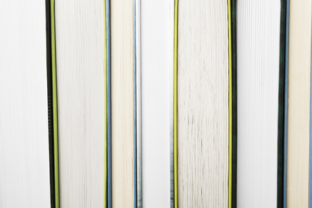 Pile of various books on dark backgroundの写真素材