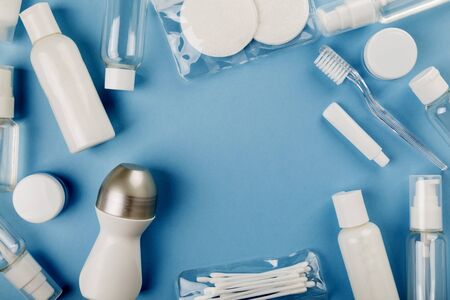 Travel small bottle set on blueの写真素材