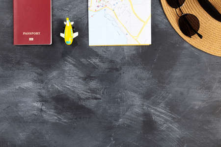 Travel accessories on table, black background. Top view. Copy spaceの写真素材