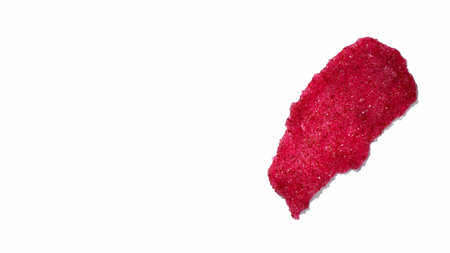 Smears of body scrub on white background. Fruit and berry body scrub texture of the swatch. Cosmetic...