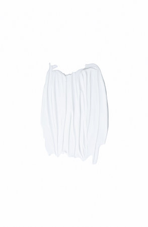 Beauty skincare cream texture swipe swatch. White beauty cream smear smudge isolated on white...