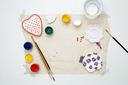Preparing clay products for painting. Hobby clay modelingの写真素材
