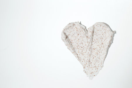 Smears of body scrub on white background. Fruit and berry body scrub texture of the swatch. Cosmetic smileの写真素材