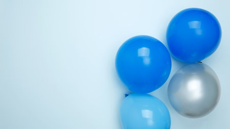 Concept of festive birthday celebrations. Birthday attributes colorful balloonsの写真素材