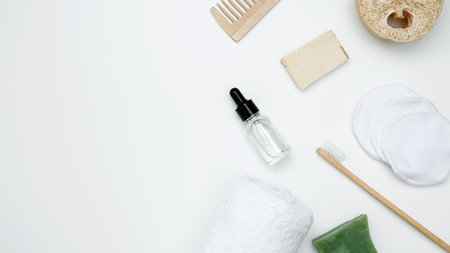 Embodying a sustainable self-care concept, eco-friendly beauty essentials, face serum, loofah,...
