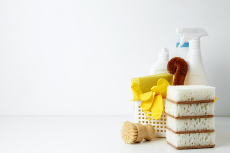 Cleaning supplies in a container, ready for a productive and satisfying spring refresh. Household cleaning and hygiene concept conceptの写真素材