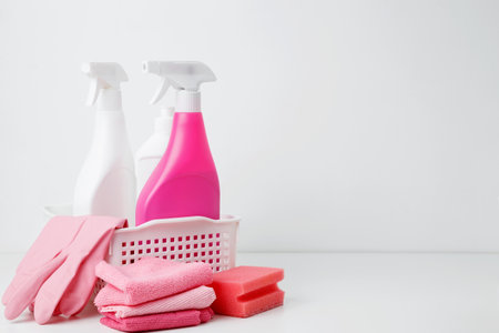 Cleaning supplies in a container, ready for a productive and satisfying spring refresh. Household cleaning and hygiene concept conceptの写真素材