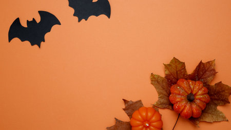 Halloween decoration pumpkins bats maple leaves autumn festive moodの写真素材