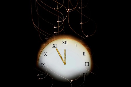Clock on a dark background with lights showing five minutes to midnight - old year ends and a new year beginsの写真素材