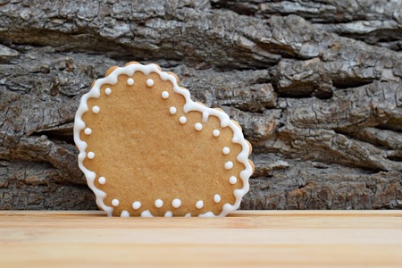 Gingerbread heart in natureの写真素材