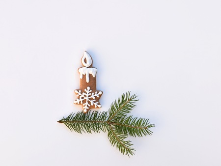 Romantic gingerbread candlestick with spruce twigの写真素材