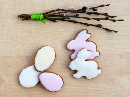Homemade Easter gingerbreads decorated with colorful icing made using natural dyesの写真素材