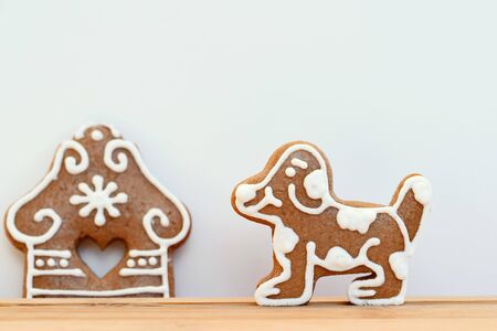 Gingerbread dog and house - living in a villageの写真素材