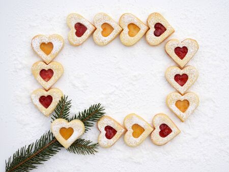 Homemade linzer cookies filled with strawberry and apricot yamの写真素材