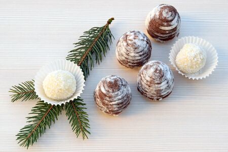 Unbaked cookies - cocoa wasp nests and coconut ballsの写真素材