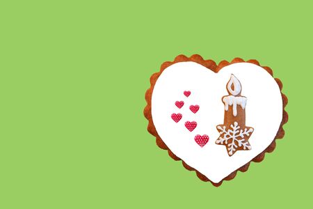 Creative composition with gingerbread candlestick and hearts.の写真素材