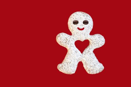 Happy smiling man - sugared cookie with coffee bean eyes, isolated, copy space. Love or medicine conceptの写真素材